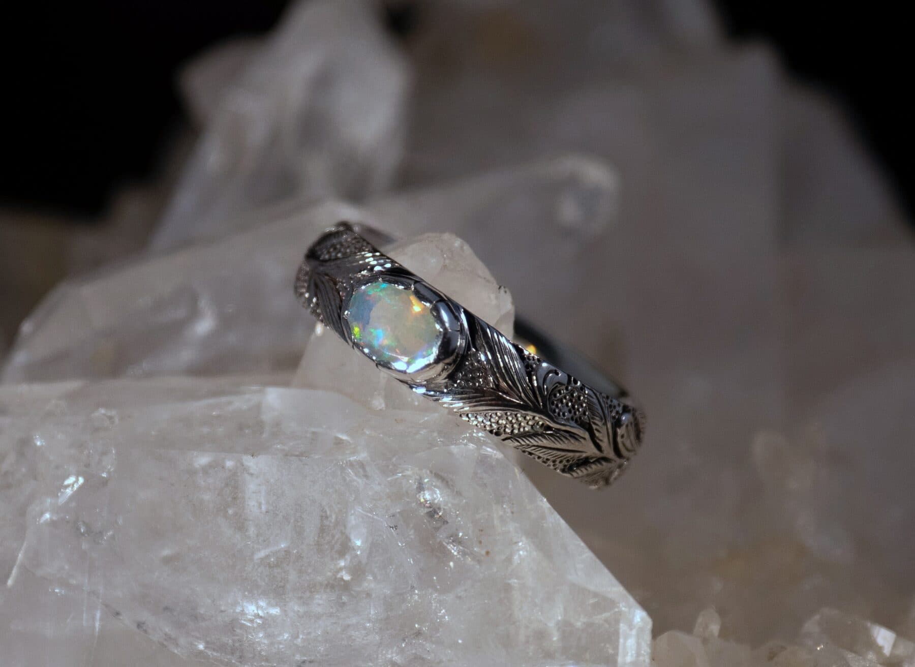 Leaf engraved silver ring with moonstone on crystal